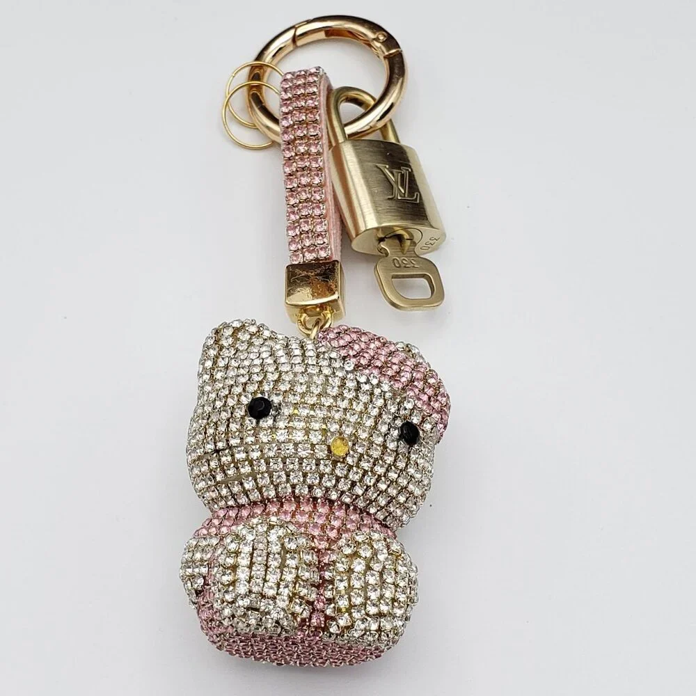 Authentic Louis Vuitton Lock & Key with Unbranded Hello kitty Charm, Keychain